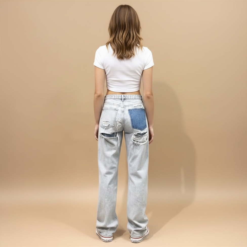Vintage jeans met gerafelde details en rechte pijpen