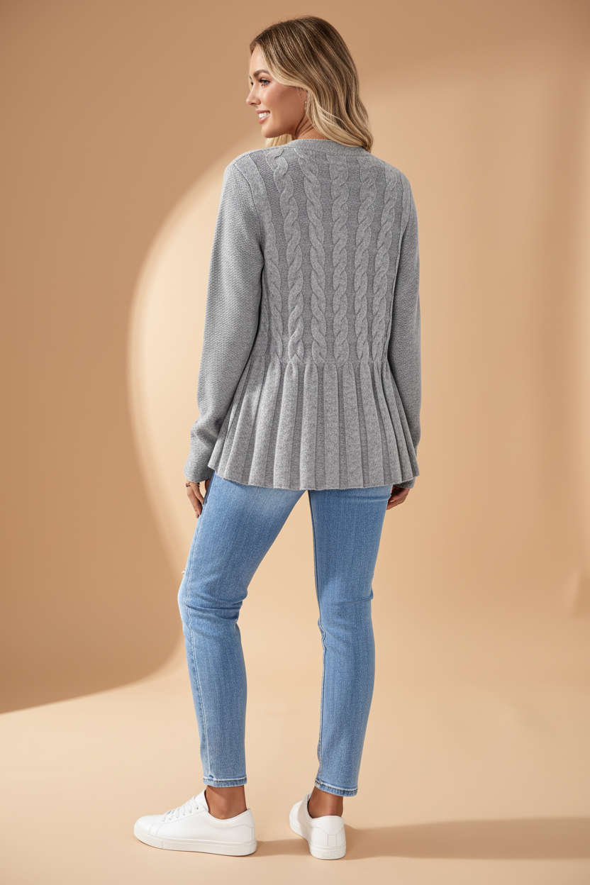Langere, licht getailleerde cardigan met creatieve breipatronen