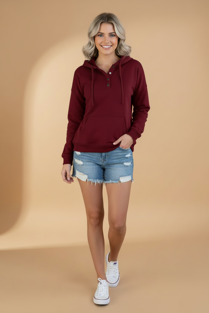 Gezellige hoodie met kangoeroezak en een rij knopen tot aan de borst